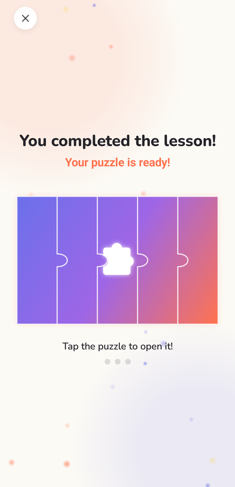You completed the lesson! A covered puzzle with the prompt Tap the puzzle to open it.